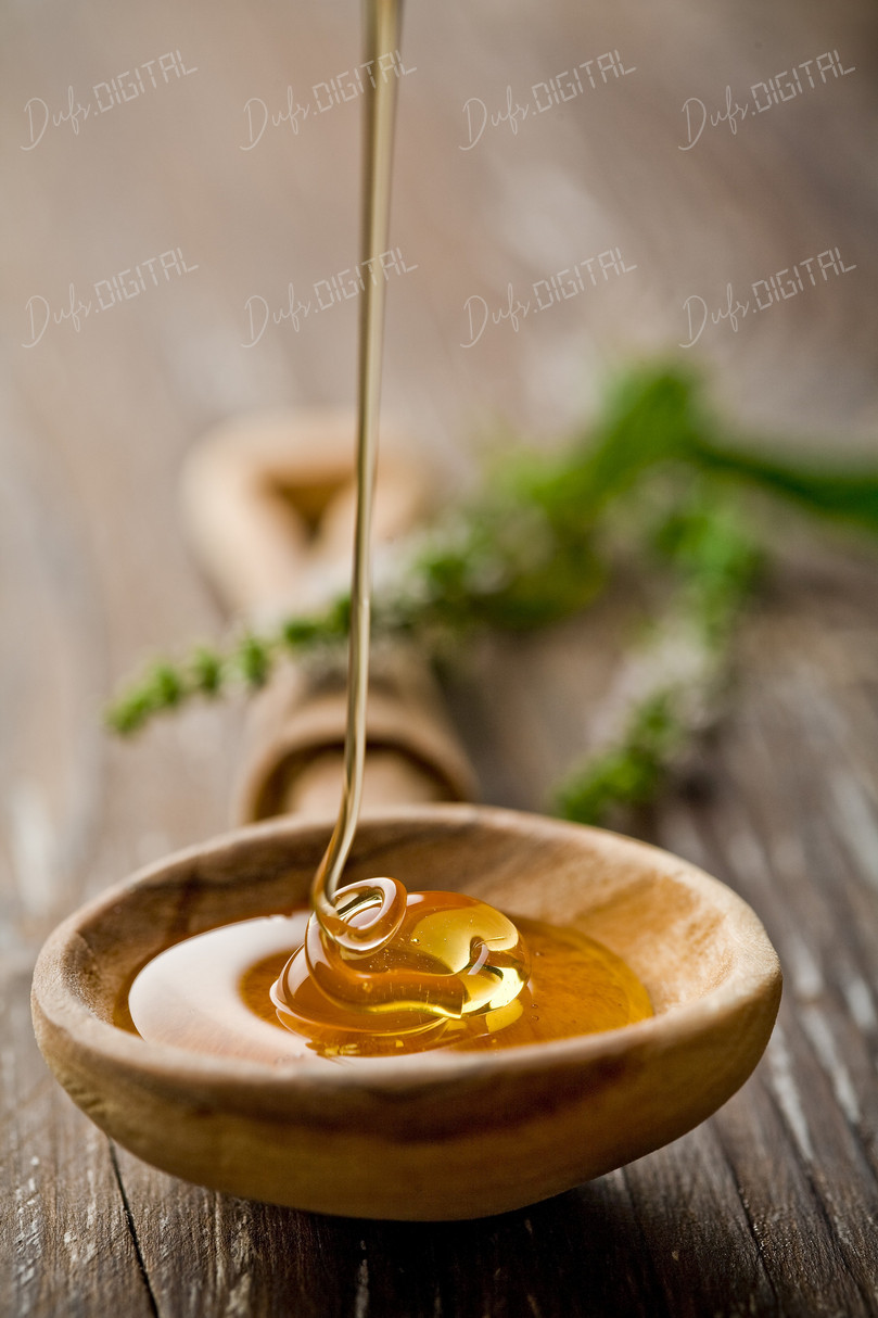 Honey Dripping from Spoon