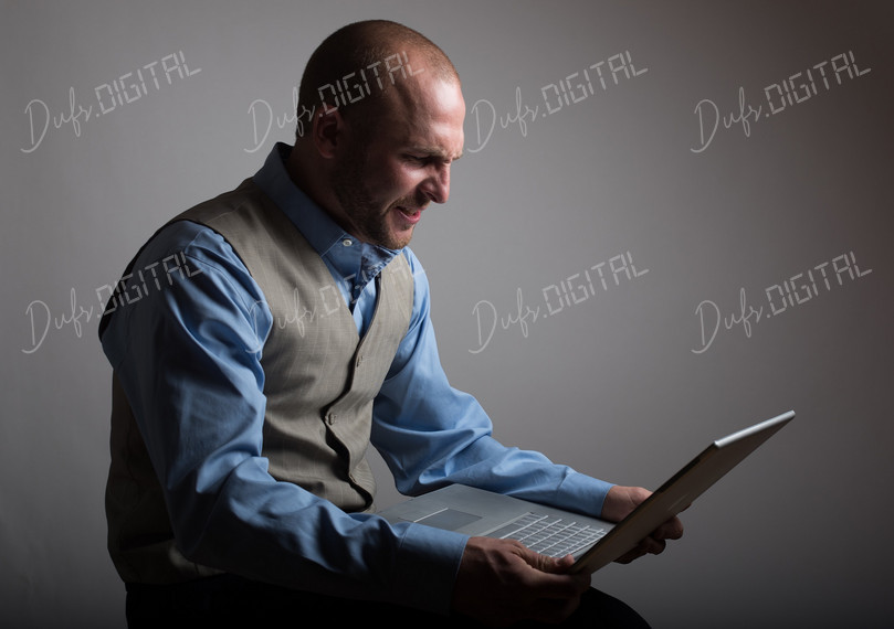 Frustrated Man with Laptop
