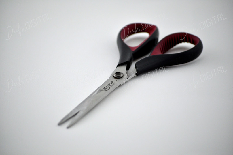 Sharp Scissors on Table