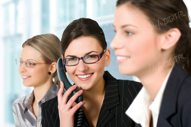 Smiling Businesswomen at Work