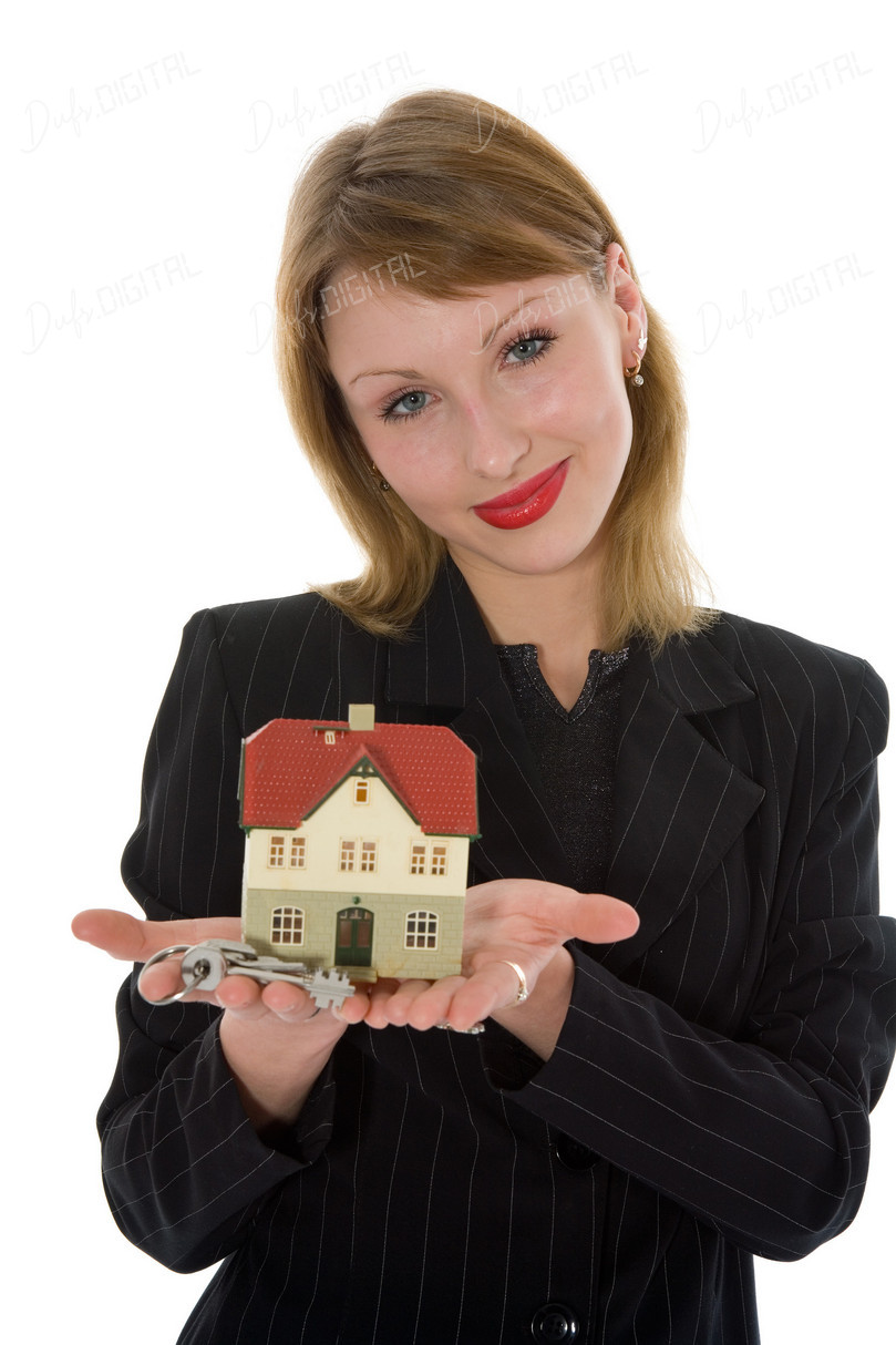 Real Estate Agent Holding Model Home
