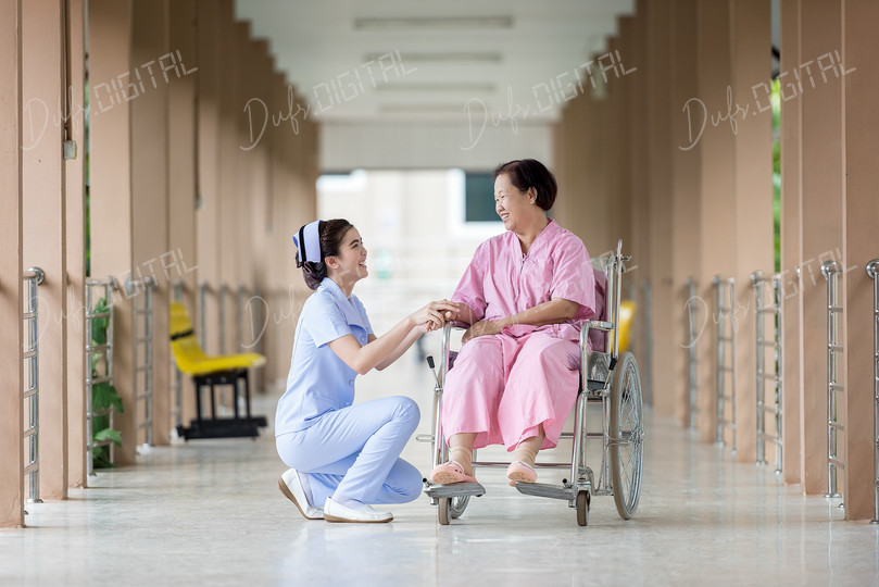 Nurse Assisting Patient