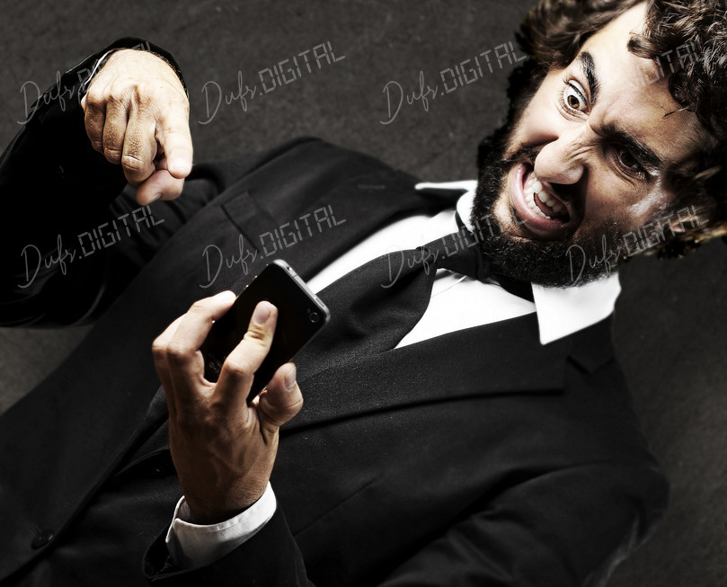 Frustrated Businessman with Phone