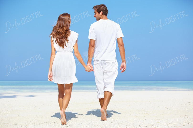 Couple Walking on Beach