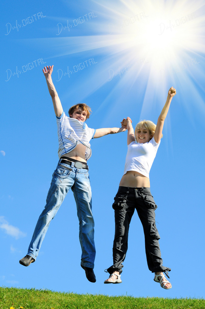 Joyful Jumping Couple