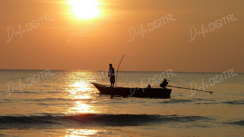 Fisherman At Sunset