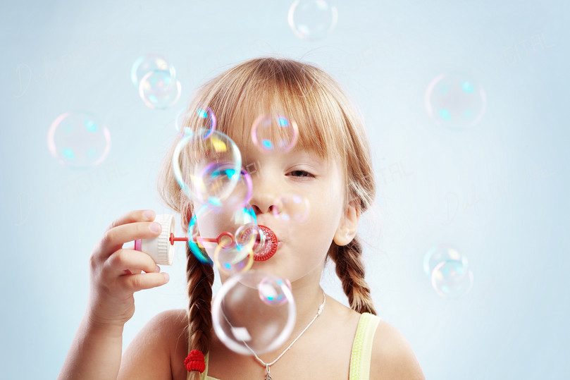 Child Blowing Bubbles