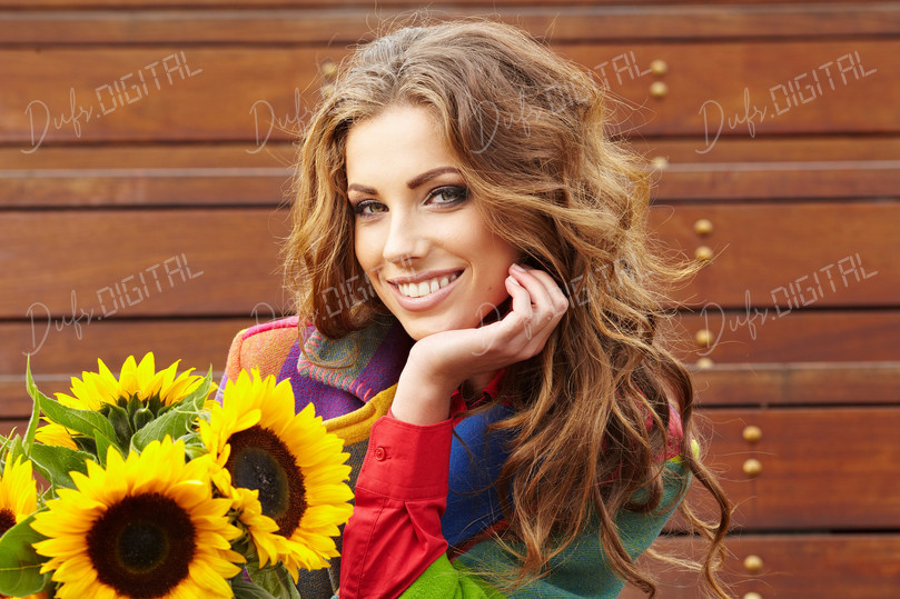 Smiling Woman with Sunflowers