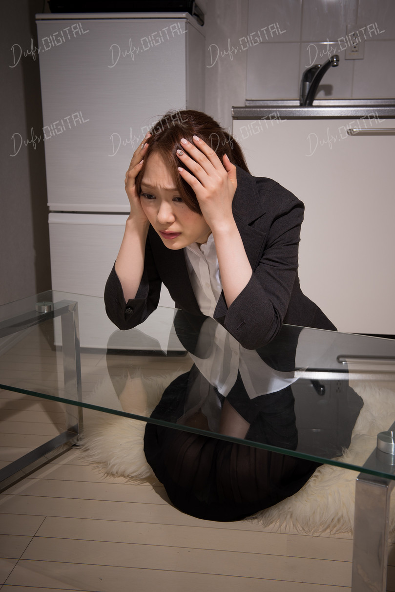 Stressed Businesswoman at Home