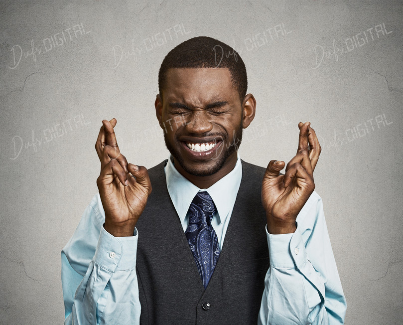 Man Crossing Fingers