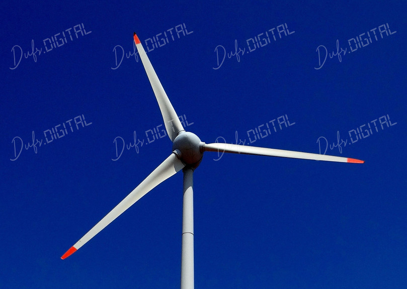 Wind Turbine Against Blue