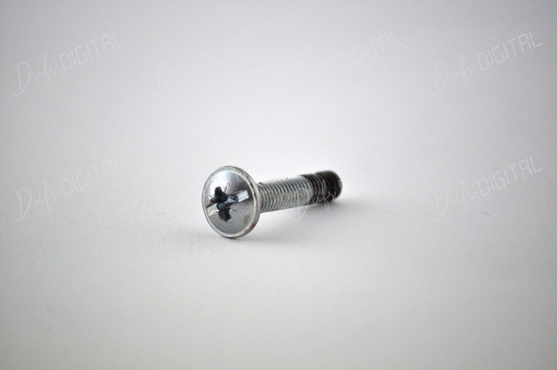 Metal Screw on White Background