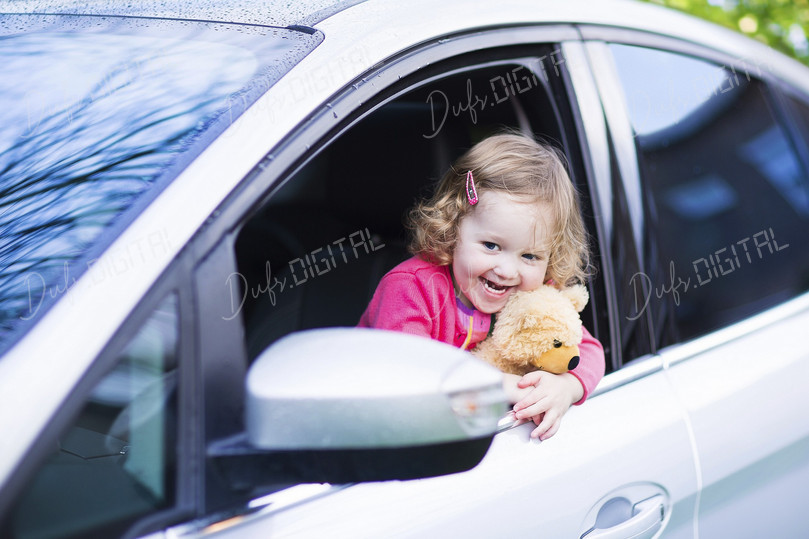 Happy Child in Car