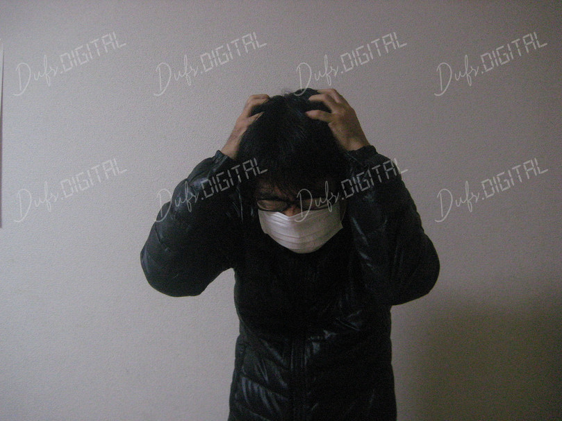 Stressed Individual with Mask