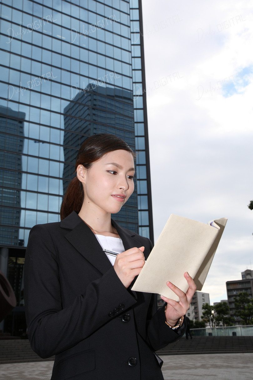 Businesswoman Taking Notes