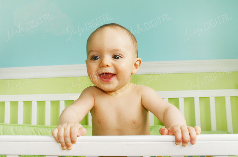 Happy Baby in Crib