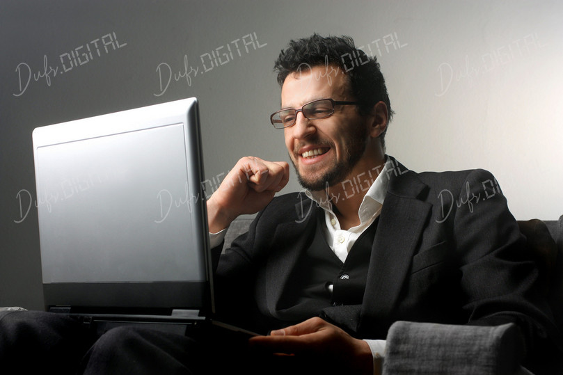 Happy Man with Laptop