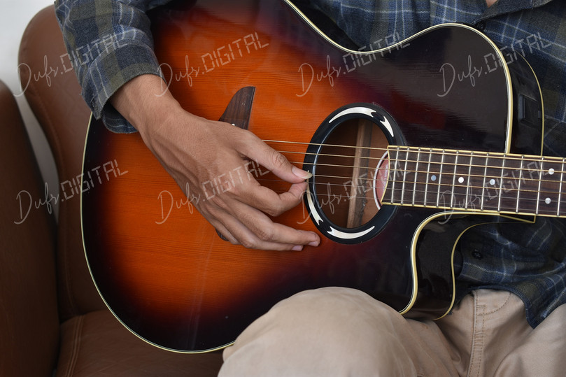 Playing Acoustic Guitar