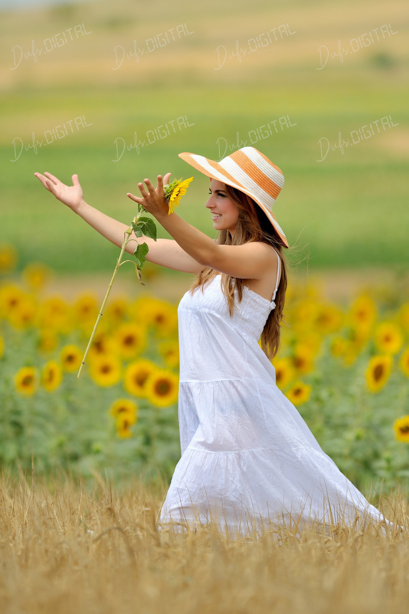 Woman Among Sunflowers