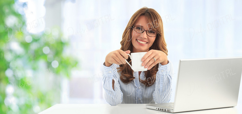Smiling Woman with Laptop