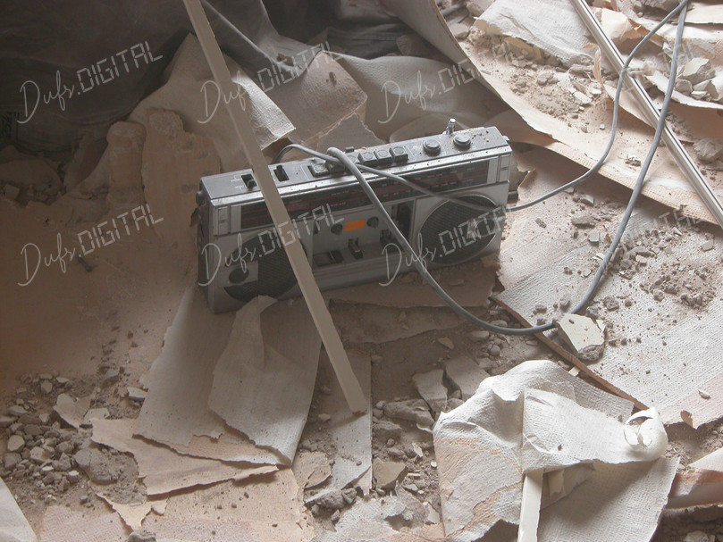 Abandoned Boombox in Ruins