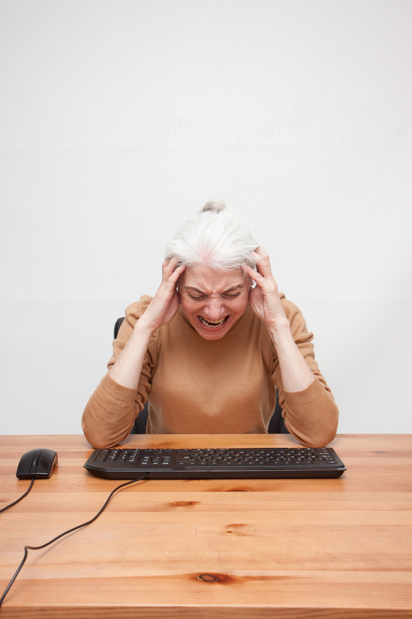 Frustrated Woman at Computer