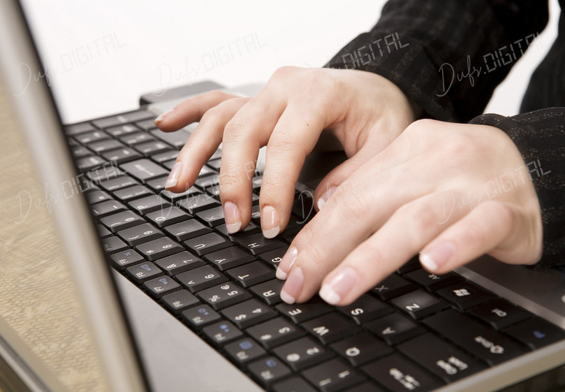 Typing on Laptop