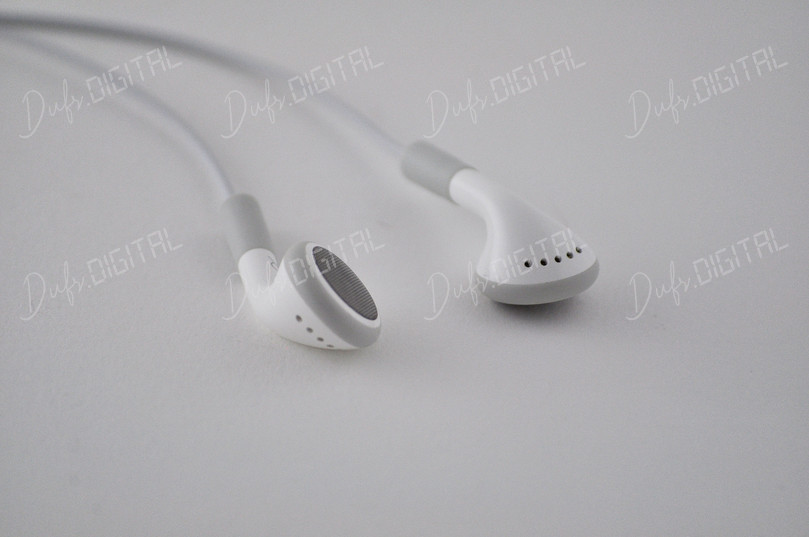 White Earphones on Surface