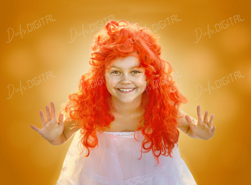 Joyful Child with Red Hair