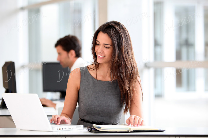 Smiling Woman at Laptop
