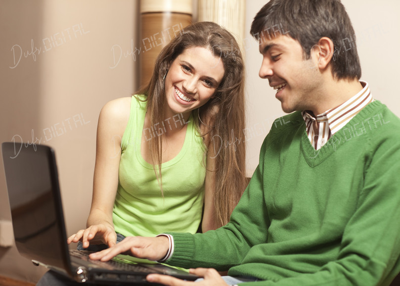Happy Couple with Laptop