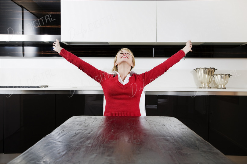 Joyful Woman in Kitchen