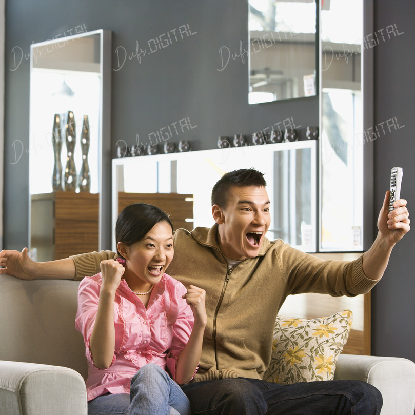 Excited Friends Watching TV