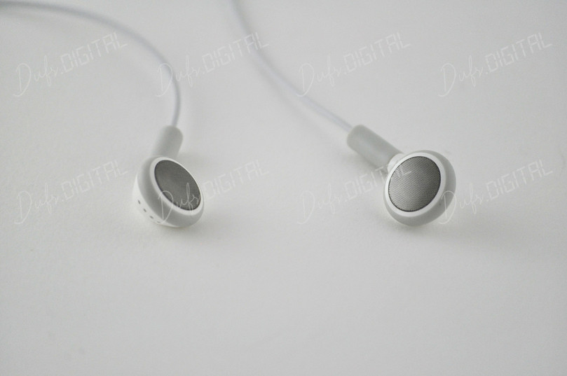 White Earbuds on Surface