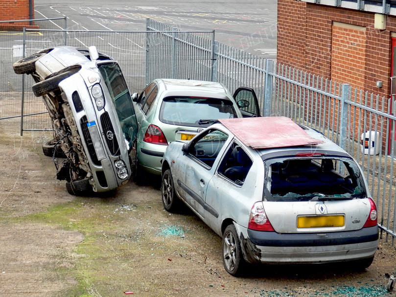 Abandoned Cars Stacked