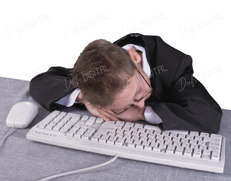 Tired Child at Desk