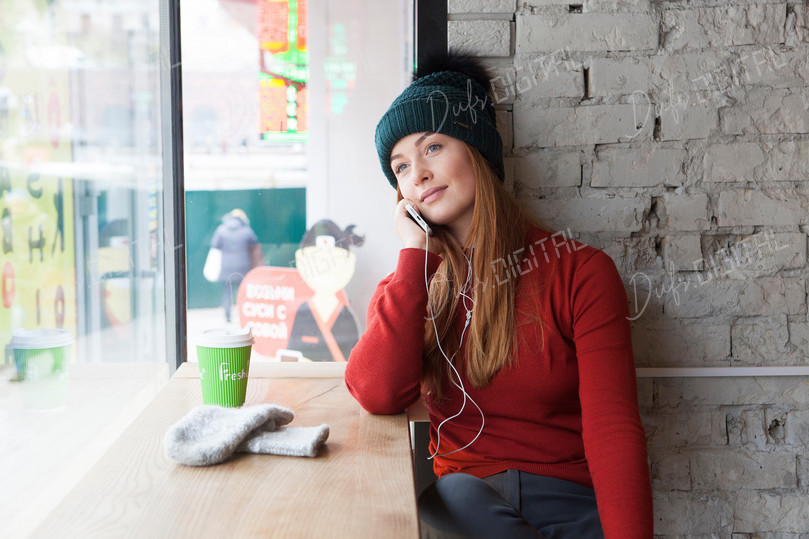 Thoughtful Woman in Cafe