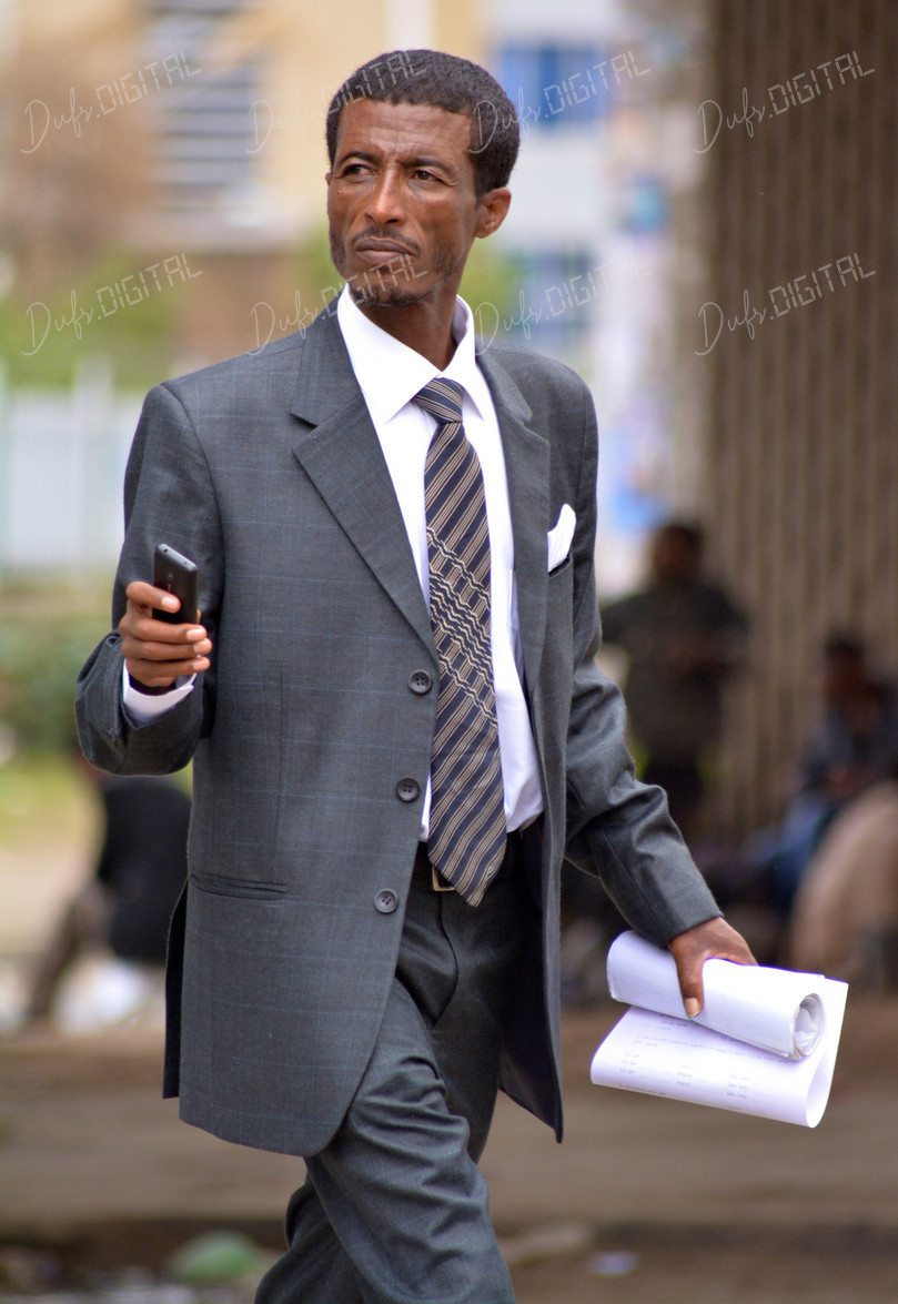 Businessman Walking Outside