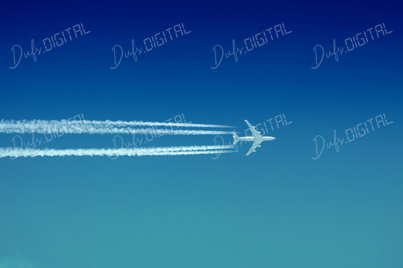 Airplane in Blue Sky