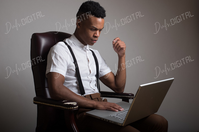 Focused Individual at Laptop