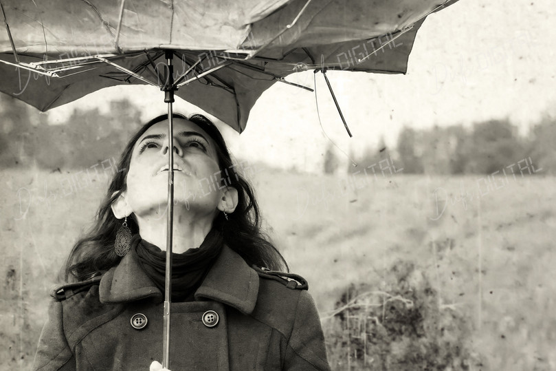 Woman Under Umbrella