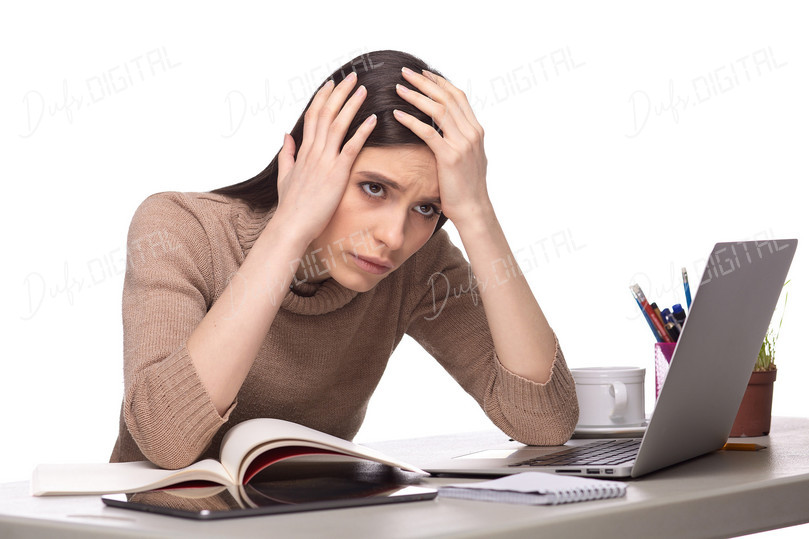 Stressed Businesswoman at Desk
