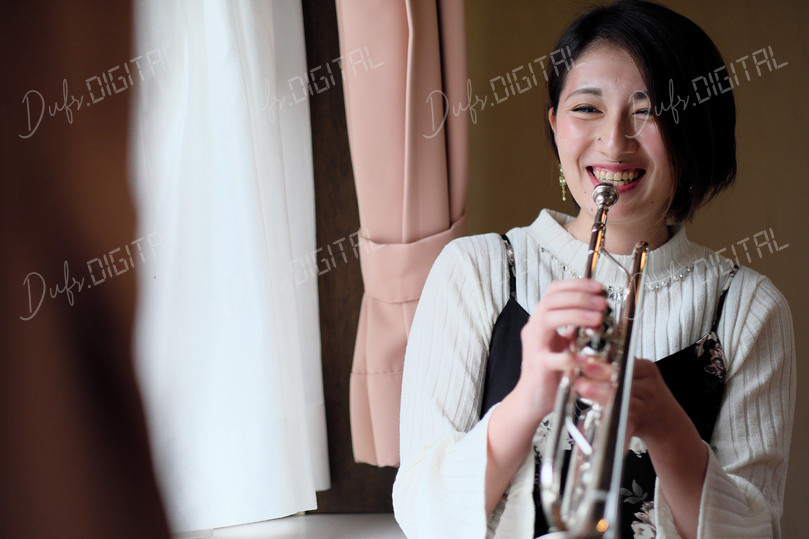 Joyful Musician Playing Trumpet